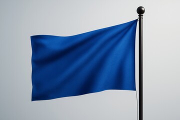 Blue flag waving on black pole against light background, minimal mockup for branding, promotion, or advertising concept with copy space.
