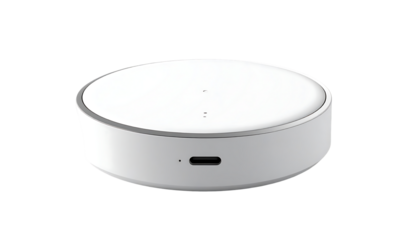 Compact, round, white smart home device with subtle top markings and a USB-C port on the bottom