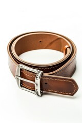A light brown leather belt with a silver buckle is neatly coiled on a white background.  The belt features subtle stitching along its edges
