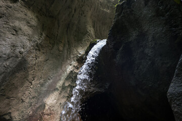 Waterfal inside a rock formation in the Carpathian Mountains, Romania
