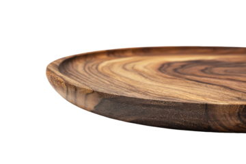 A large, round wooden serving platter with a rich, dark brown finish and visible wood grain, gently curved edges