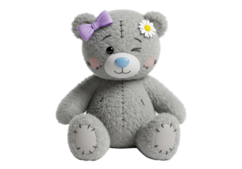 Isolated gray stuffed toy bear with a lilac bow and a daisy, sitting pretty on its bottom
