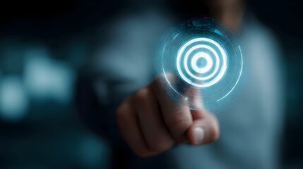 A finger presses a glowing blue digital target interface on a futuristic screen