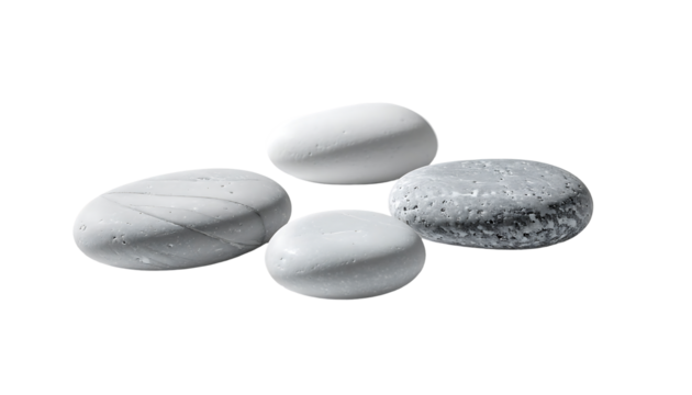 Four smooth, grey and white stones, varying in size and texture, rest on a black background