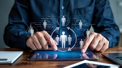Man s hands interacting with a digital interface displaying a network of people icons representing human resources and organizational structure