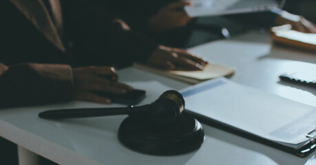 Lawyer explained to the client about the law that must be brought against the court case.