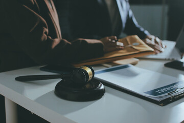 Lawyer explained to the client about the law that must be brought against the court case.
