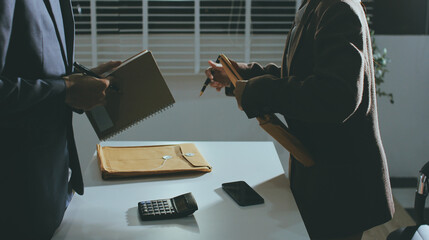 Lawyer explained to the client about the law that must be brought against the court case.