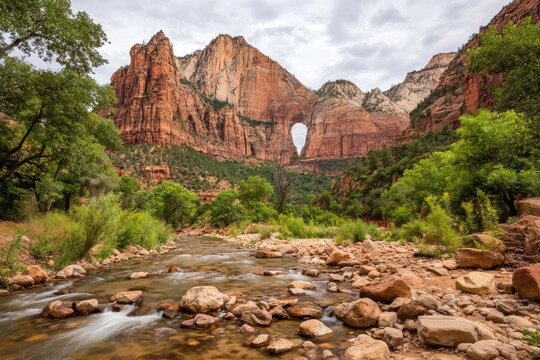 Red rock canyon vista with river and arch