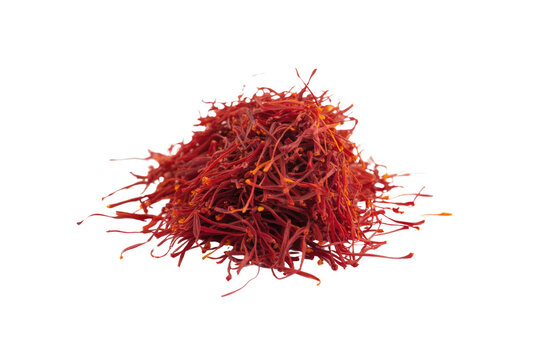 A pile of dried saffron threads, a valuable spice with a rich red color and intense aroma. background removed