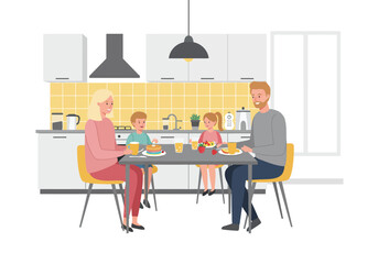 Family of four is sitting at a table in a kitchen eating pancakes fruit and juice