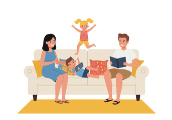 Family of four on a couch reading  playing