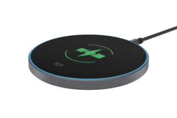 A sleek, round wireless charging pad with a green lightning bolt indicator, signifying IoT integration. background removed