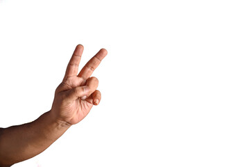Hand Displaying Peace Gesture Against White Background