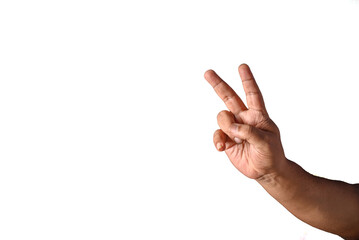 Hand Displaying Peace Gesture Against White Background