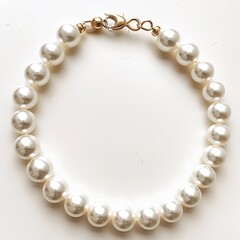 Obraz premium A simple bracelet featuring large, lustrous off-white pearls strung on a delicate gold clasp