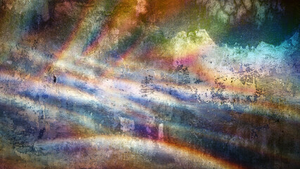 Light reflections create an abstract pattern of vibrant colors on a grunge textured wall,...