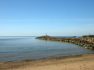 Fototapeta premium warm autumn day by the sea, calm water, silence in nature, Baltic Sea coast