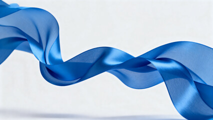 Blue satin ribbon flowing in a wavy pattern against a light background