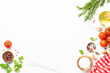 Spices, herbs, olive oil and fresh tomatoes.