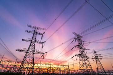 The pylons are in the evening, Substation in the evening, High voltage substation and beautiful sunset glow