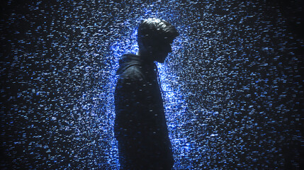 Silhouette of a person standing in front of a glowing blue digital matrix background