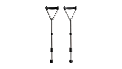 Pair of sleek, silver-toned forearm crutches with black accents at the top and bottom, isolated on a black background