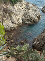 Rocky coastline cliffs with blue sea ocean horizon natural scenic marine landscape summer vacation travel seascape view