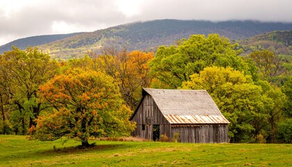 Obraz premium Autumnal barn nestled in valley