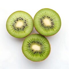 Fototapeta premium Three halved kiwi fruits arranged in triangular formation showing green flesh and black seeds on white background 