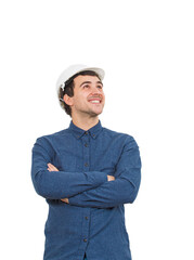 Confident man engineer wearing protective white helmet, keeps arms folded, looking up positive smiling, isolated on transparent background