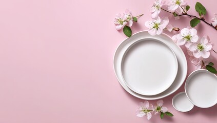 Pastel pink background, nested white plates & bowls, adorned with delicate pink blossoms; spring aesthetic