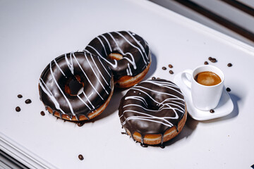 Indulge in the Delicious Chocolate Donuts perfectly paired with a delightful Coffee Shot