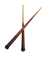 Two crossed, dark-wood pool cues with intricate grain patterns, showcasing polished tips and slender shafts