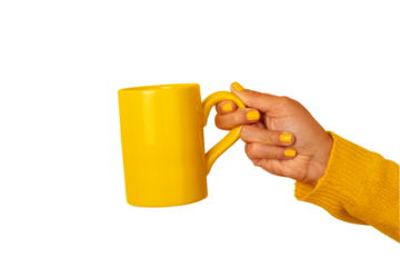 Female hand holding a vibrant yellow ceramic mug against transparent background. Colorful, minimal, and suitable for coffee, tea, breakfast, or lifestyle concepts.