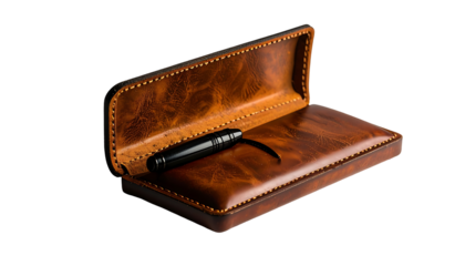 Open brown leather case with stitched edges displays a dark slender object inside
