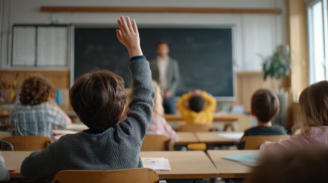 classroom primary school students, teacher is standing in front of the blackboard giving a lesson,  student raises his hand, 16:9