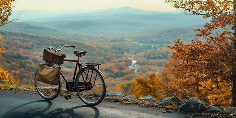 Vintage Bicycle with Scenic Autumn Landscape on a Mountain Road