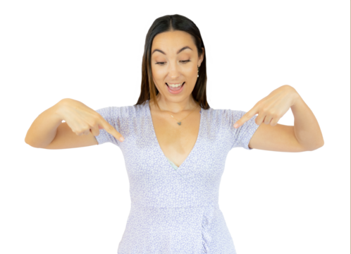 Young excited caucasian woman points down with fingers isolated over transparent background. PNG transparent