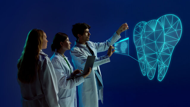 Graphic collage. Scientists examining large holographic tooth projection with glowing digital details and anatomical structure. Concept of dentistry, futuristic medicine, and medical education.