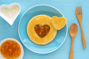 Pancake with apple jam for tasty breakfast.