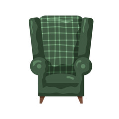 Stylish green wingback chair with plaid upholstery in a cozy setting