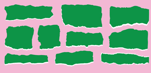 Green torn paper pieces are scattered randomly on a pink background with a transparent surface