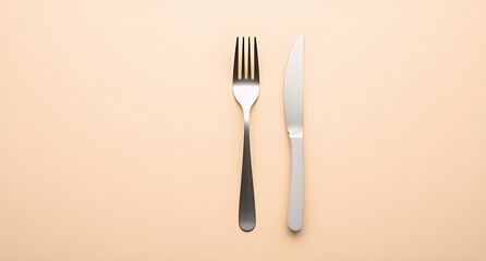 fork and knife isolated on pastel background, minimalist and elegant background