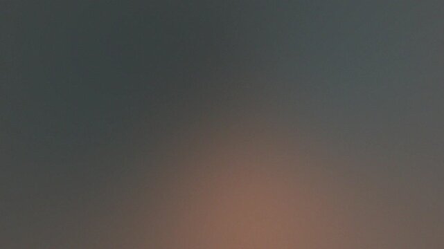 Gray and yellow gradient background animation with smooth abstract motion and copy space for modern dynamic video backdrops with noise texture loop