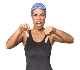 Pro Latina swimmer in studio gear showing thumb down and expressing dislike.