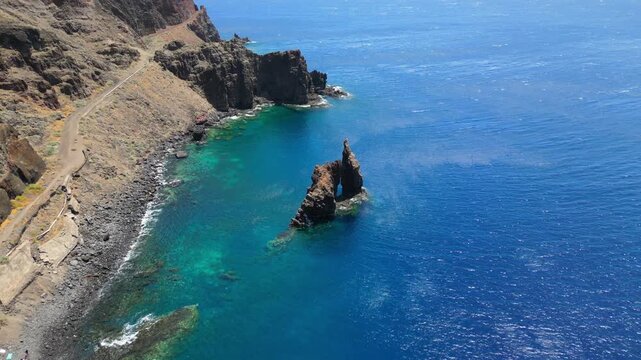 Roque de Bonanza is one of the symbols of El Hierro island and its natives. Huge Rock sticking out of the water on the las Almorranas beach. El Hierro, Canary islands, Spain, Europe	