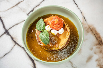 A top view of savory pancakes with smoked salmon.