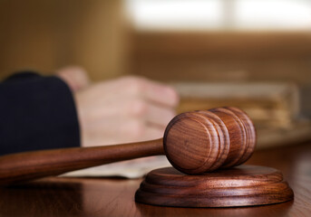Wooden gavel on desk