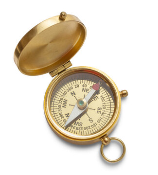 Brass magnetic compass on white background
